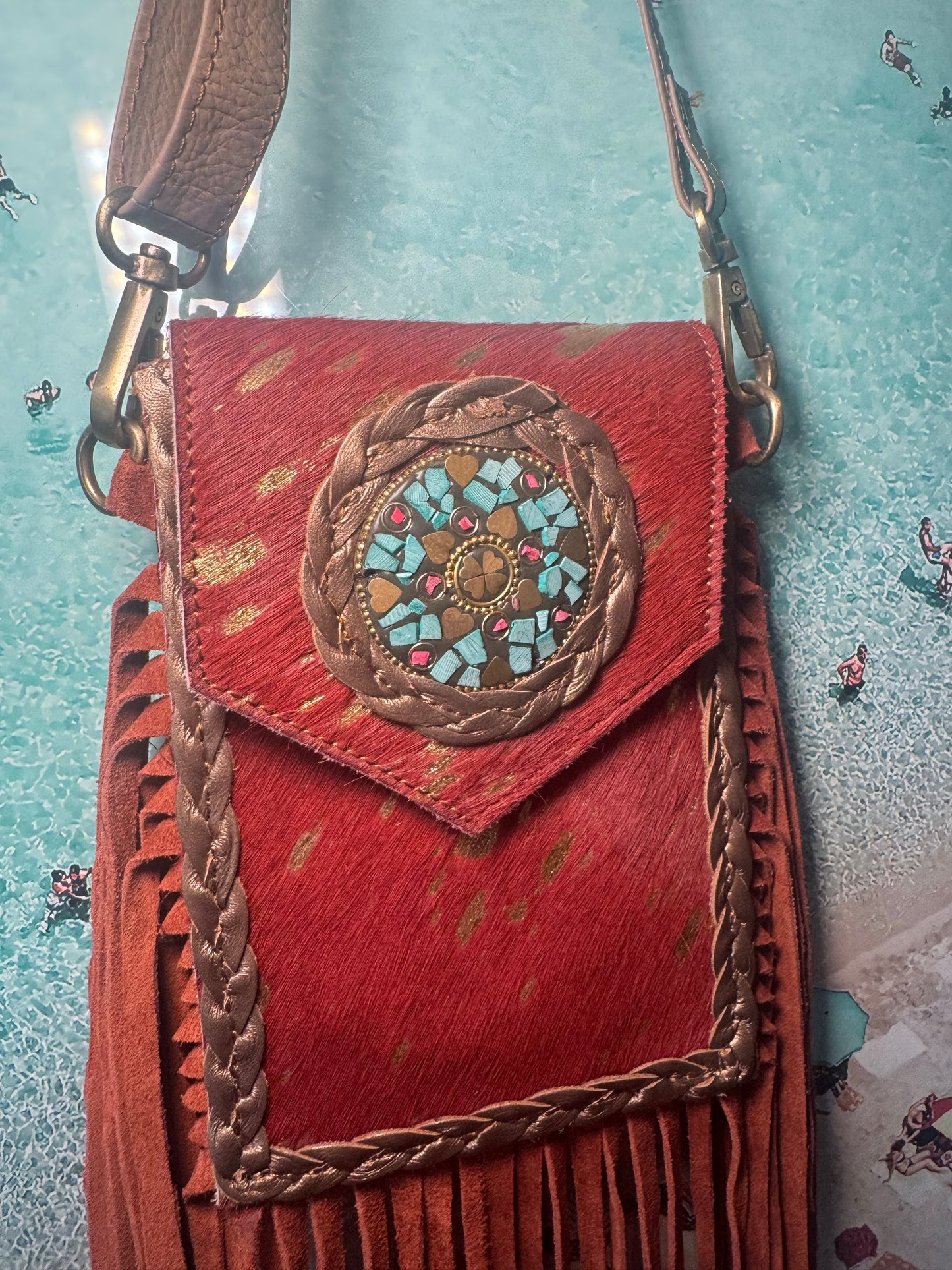 Orange mobile tassel bags