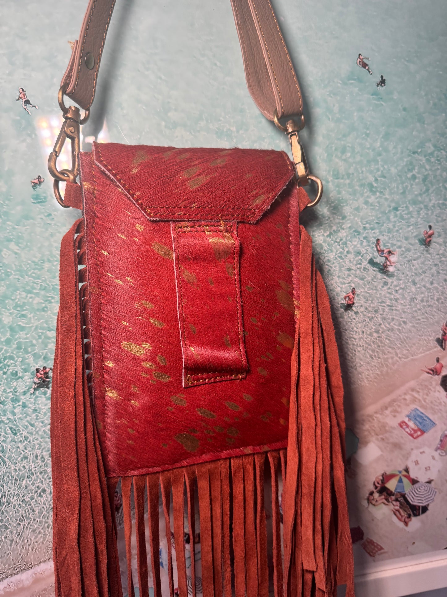 Orange mobile tassel bags