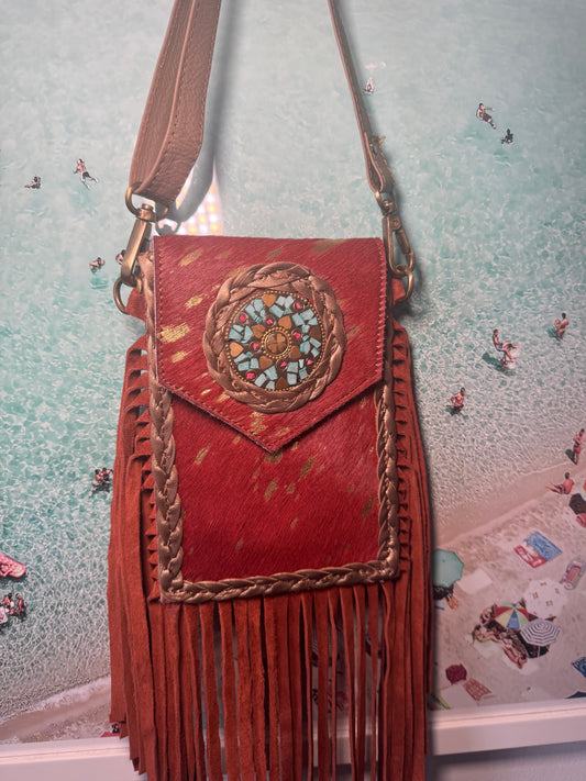 Orange mobile tassel bags