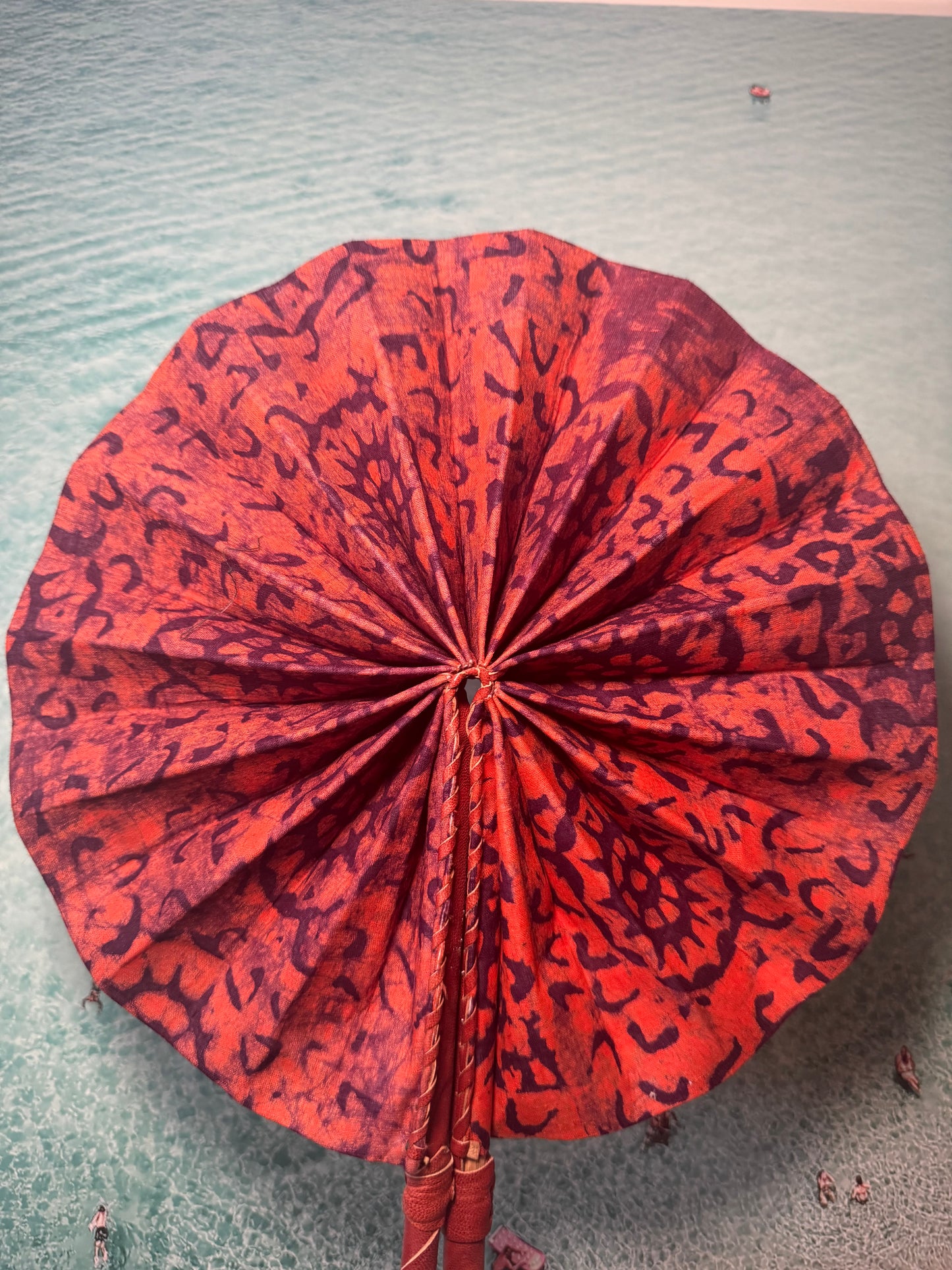 Orange and purple leopard print fan