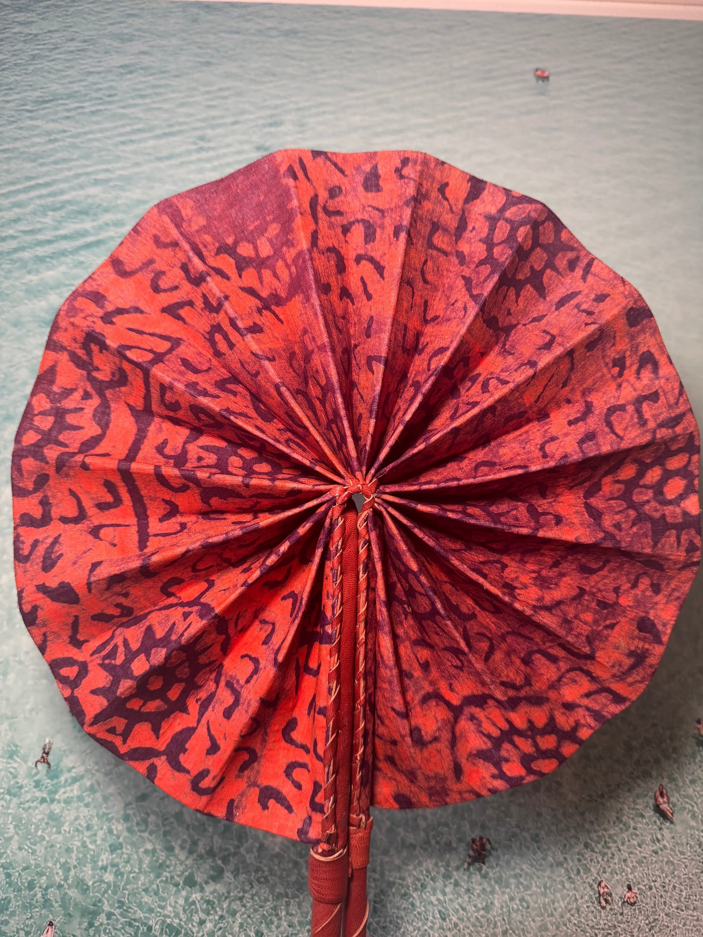 Orange and purple leopard print fan